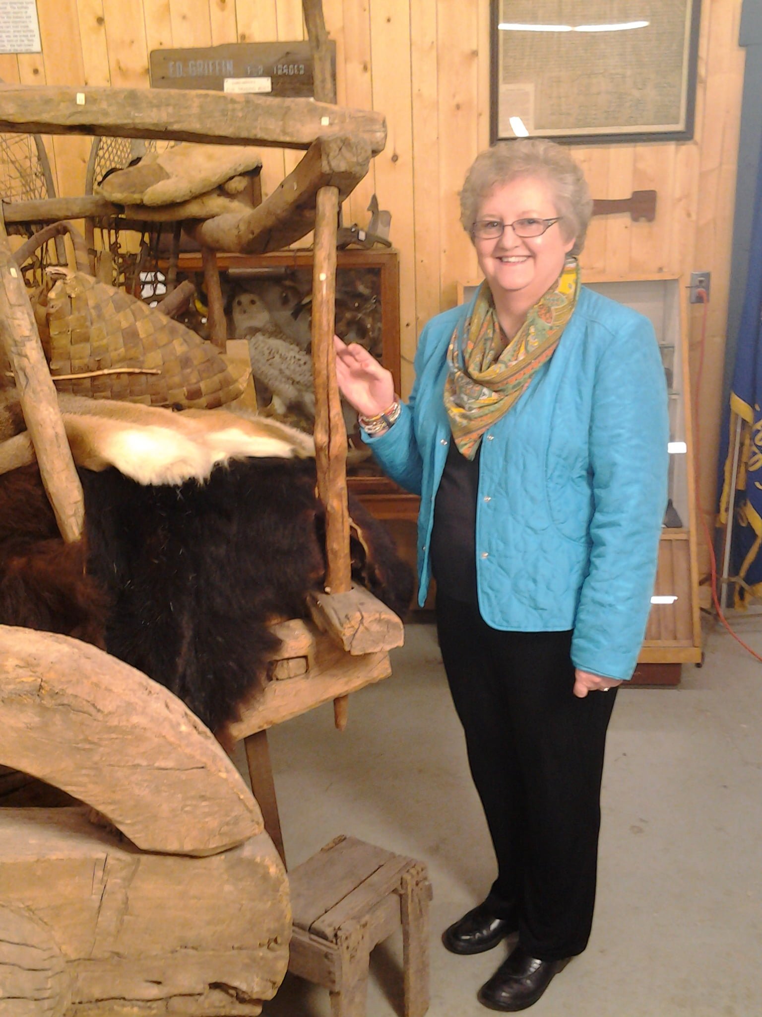 Candace Simar Poses with Real Wooden Oxcart
